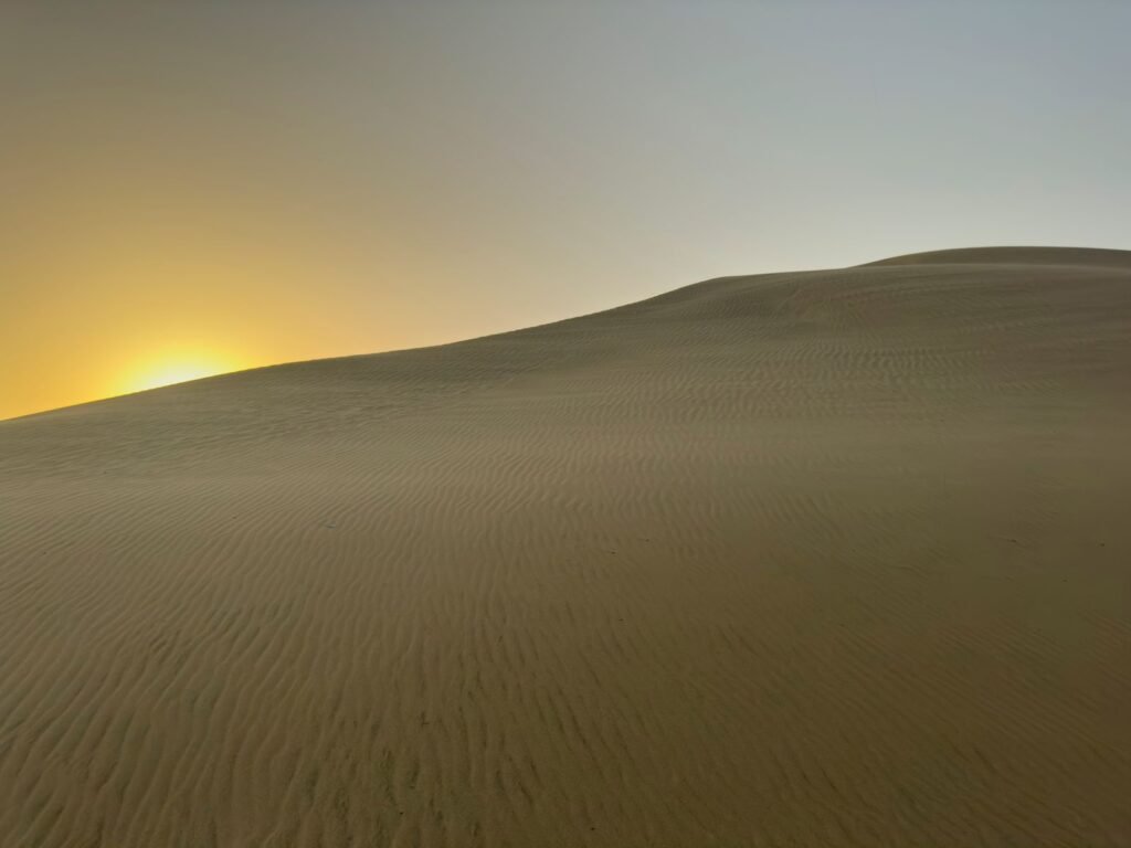 A minimal desert ridge under open sky